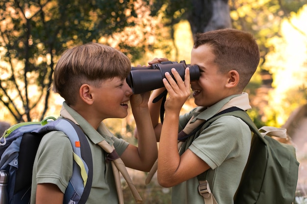 Free Photo boy scouts spending time in nature