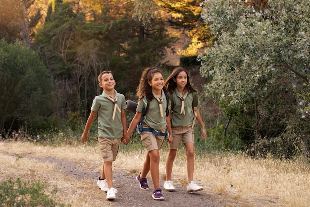 Free photo boy scouts spending time in nature