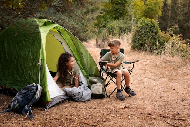 Free photo boy scouts spending time in nature