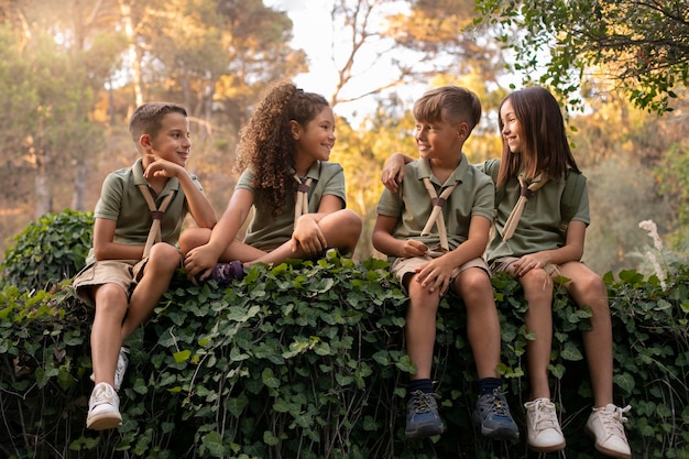 Free photo boy scouts spending time in nature