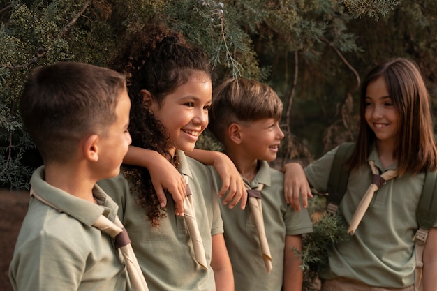 Free photo boy scouts spending time in nature