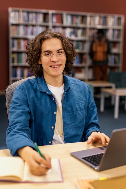 Boy studying in the university library