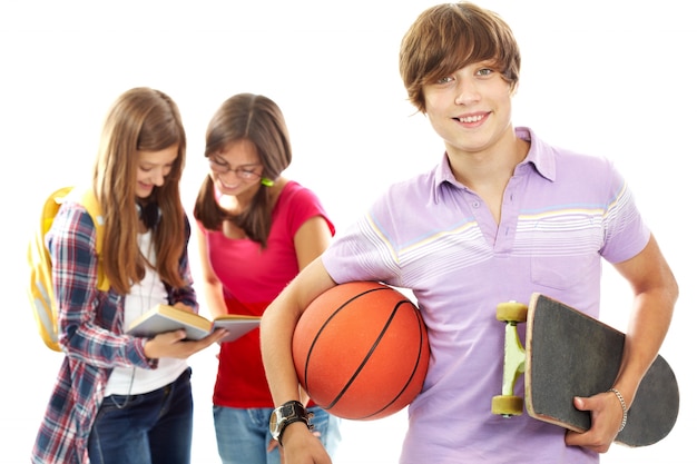 Free Photo boy with basketball and skateboard