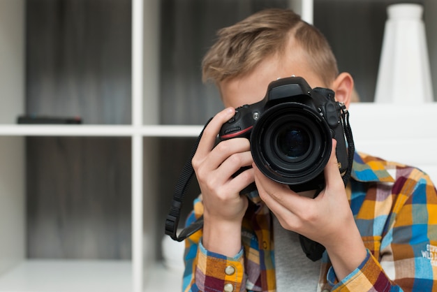 Free Photo boy with camera