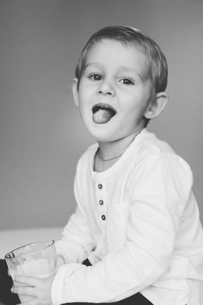 Free Photo boy with  glass of milk portrait