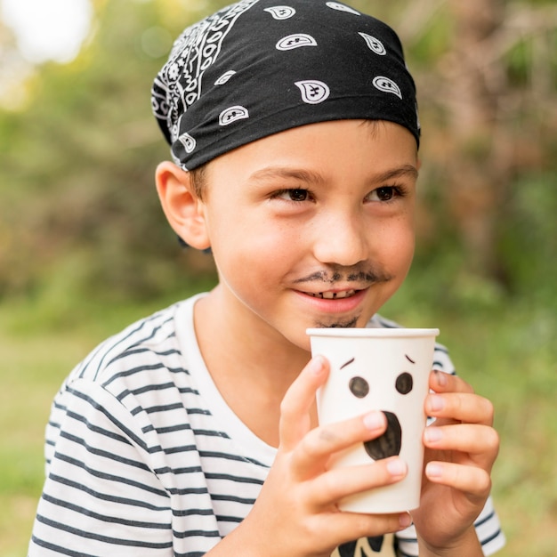 Boy with pirat halloween costume