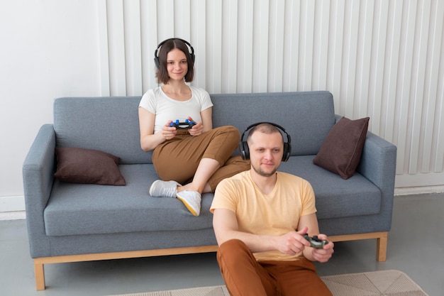 Boyfriend and girlfriend playing videogames