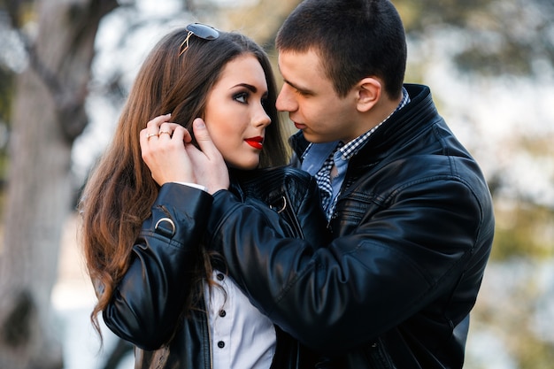 Boyfriend touching his partner's cheek