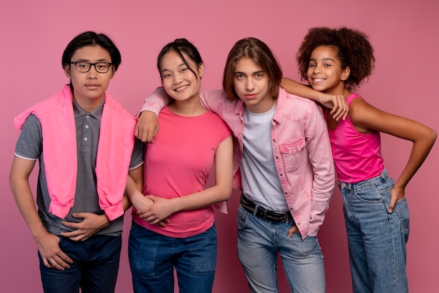 Boys and girls posing in pink