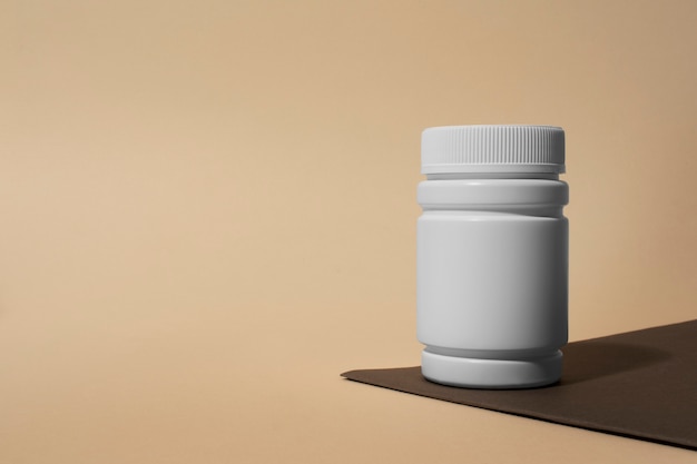 Free Photo brain booster pills container  still life