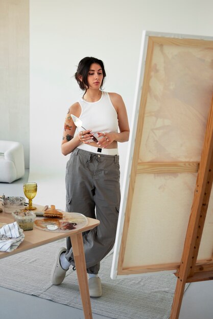 Braless woman working indoor