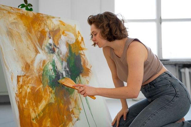 Free photo braless woman working indoor