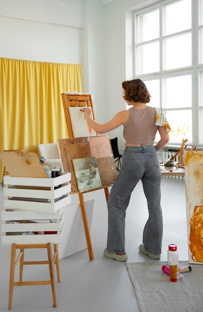 Free Photo braless woman working indoor