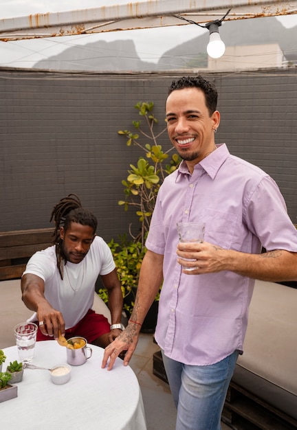 Free Photo brazilian family enjoying meal together