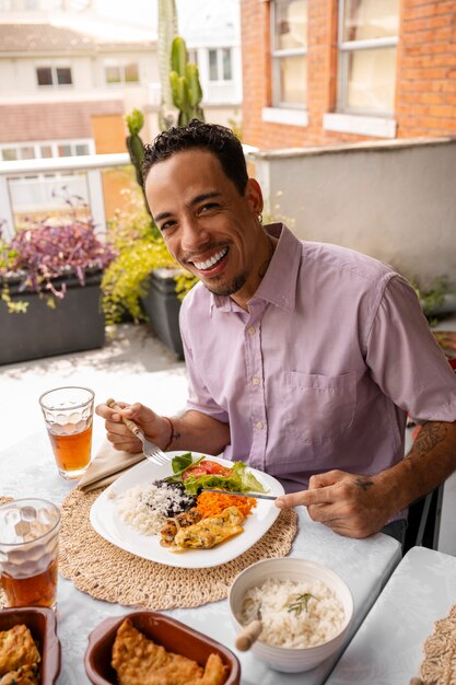 Brazilian family enjoying meal together