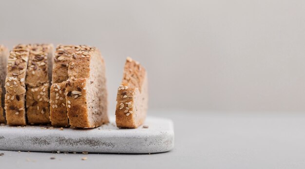 Bread slices on white cutting board