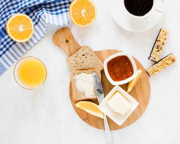 Bread slices with butter and jam