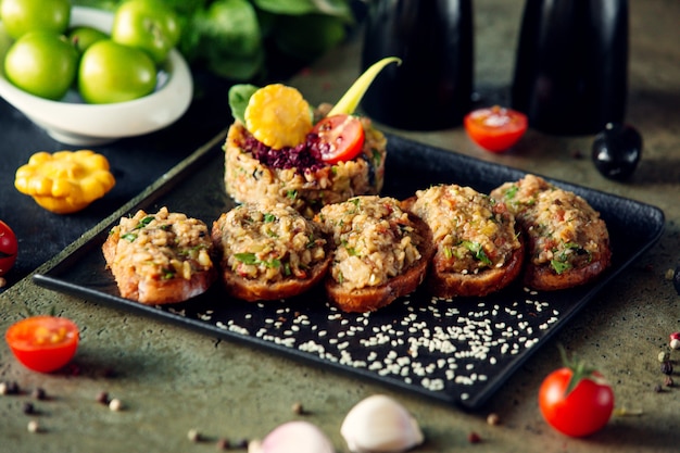 Bread slices with salad on top