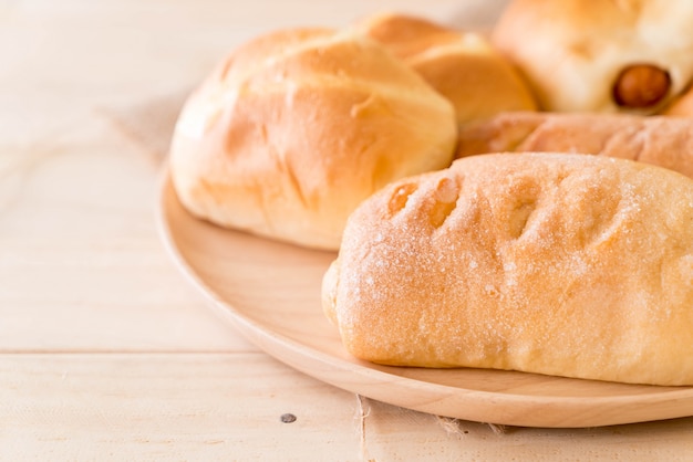 Free photo bread in wood plate