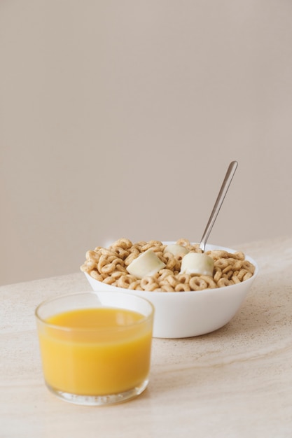 Breakfast with cereals and orange juice