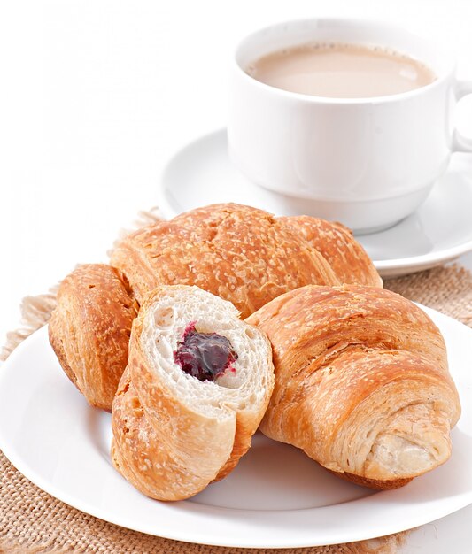 Breakfast with coffee and fresh croissants