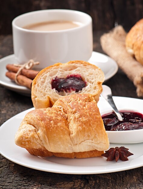 Breakfast with coffee and fresh croissants