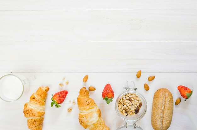 Breakfast with croissants and fruits