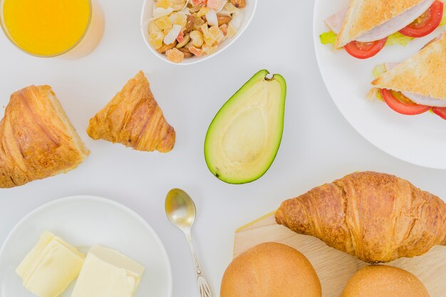 Breakfast with croissants and fruits