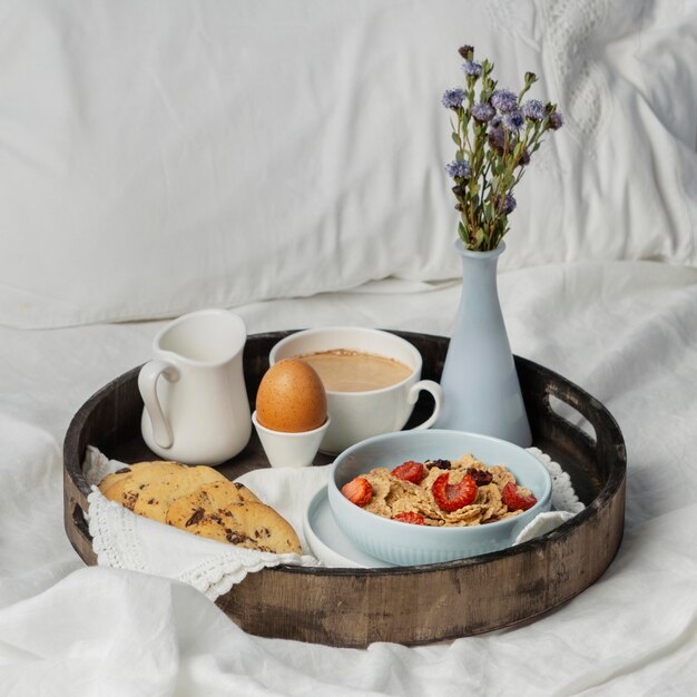 Breakfast with egg and cookies high angle