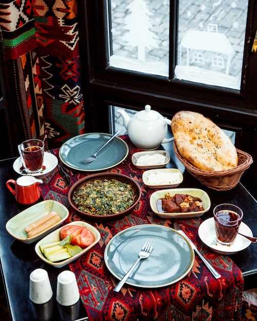 Breakfast with kyukyu and butter with cheese and sausages