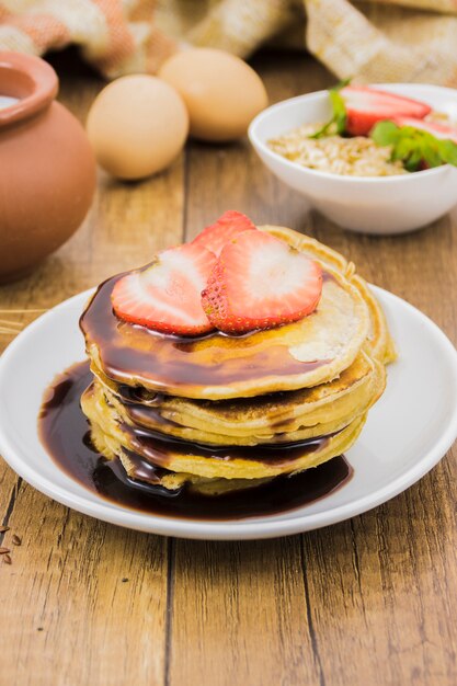 Breakfast with pancakes and strawberries