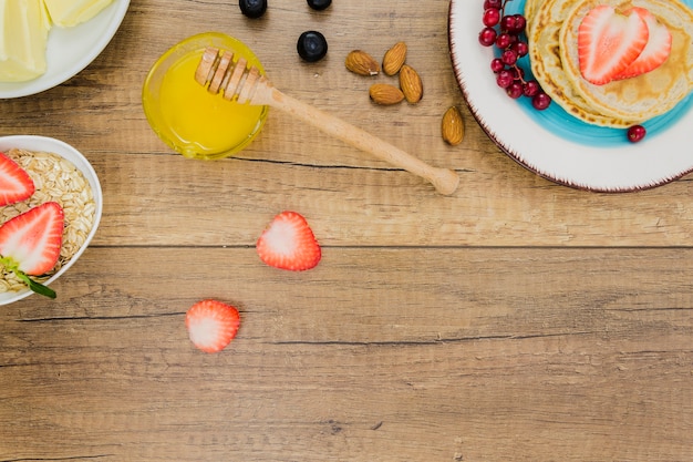 Breakfast with pancakes and strawberries