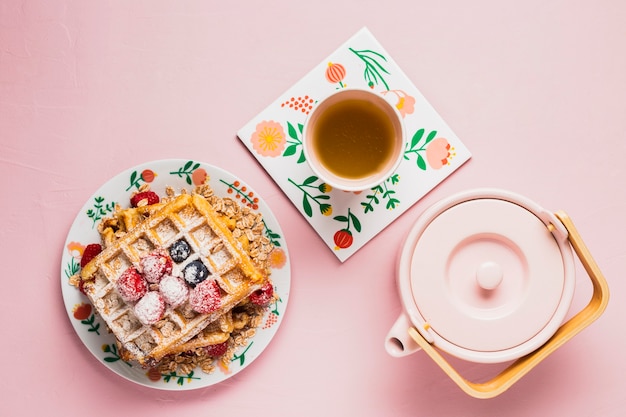 Free photo breakfast with tea and waffles