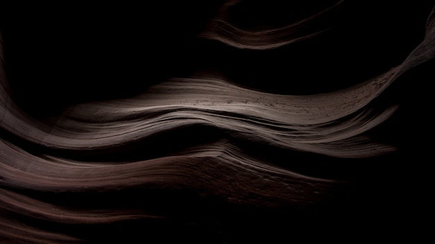 Breathtaking scenery of beautiful sand textures in the dark in Antelope Canyon, USA