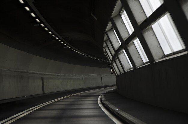 Breathtaking view of lightened tunnel road