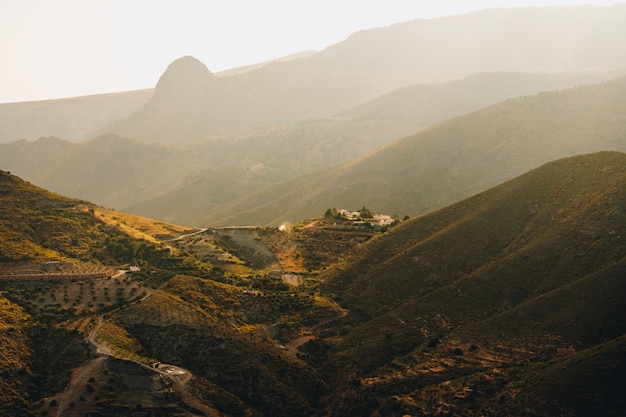 Breathtaking view pf the tree covered mountains captured at day time in Andalucia, Spain