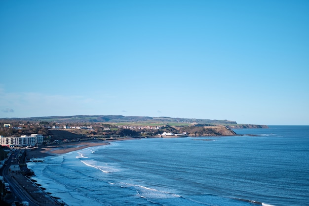 Breathtaking view of the seashore street and a clear blue sky