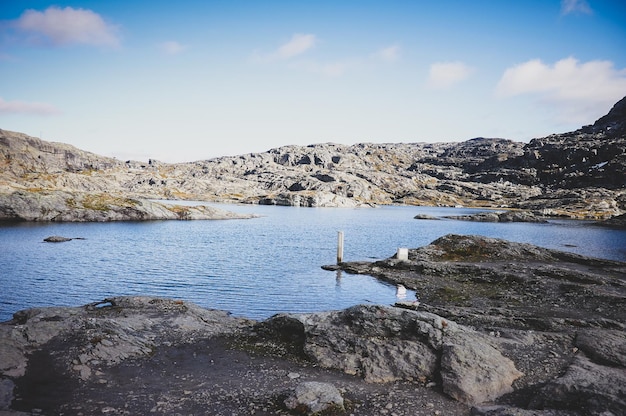 Breathtaking views of Norwegian national park, river and fjords at bright day.