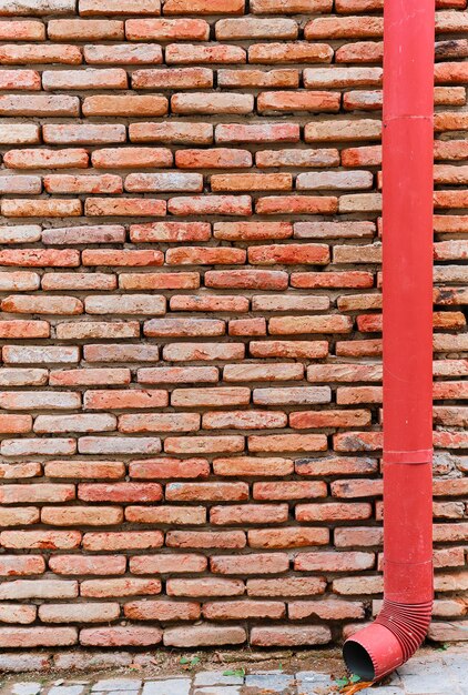 Brick facades of old houses renovation of houses in old cities The idea of a background or screensaver from red old brick wallpaper design