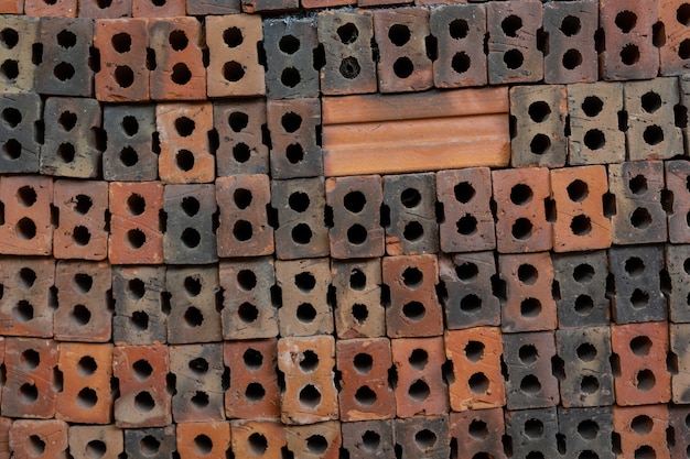 Free photo brick piles placed on the factory floor.