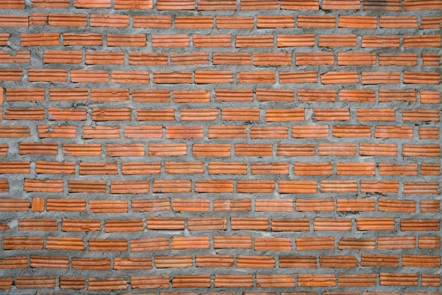 Free photo brick wall with fresh cement