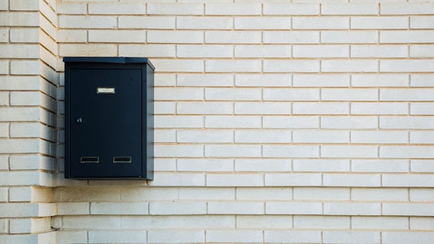 Free photo brick wall with mailbox