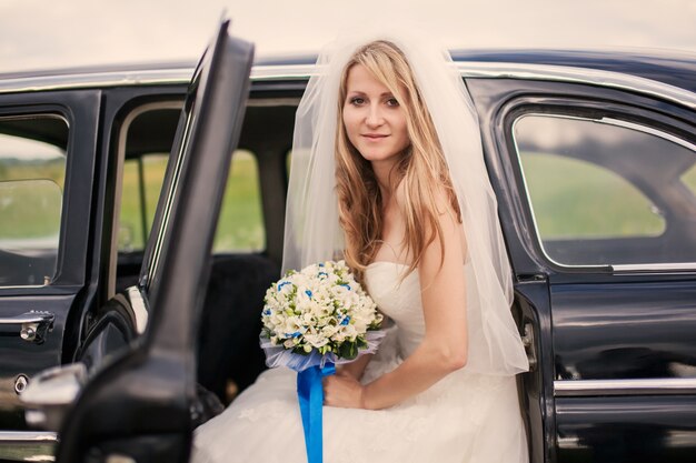 Bride getting in the car