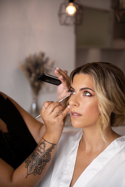 Bride getting ready for wedding side view