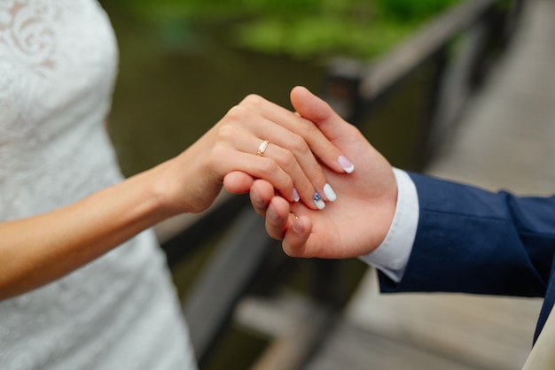 Free photo bride and groom outdoor in nature location. wedding couple in love at wedding day.