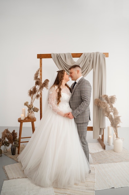 Bride and groom posing happily together after wedding ceremony