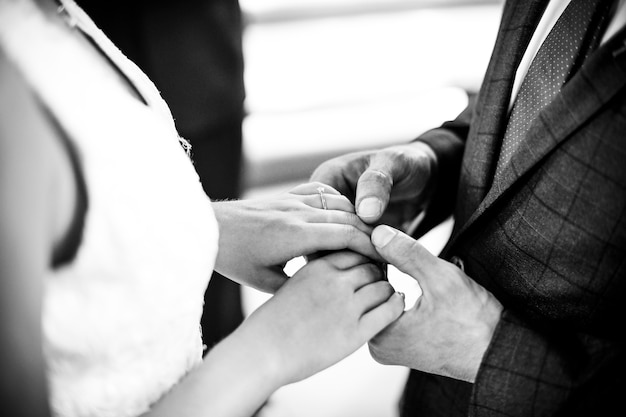 Free photo bride and groom standing at the altar