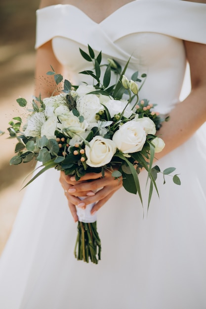 Bride holding her wedding bouquet