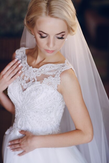 Bride looking her wedding dress