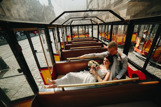 Bride lying on groom